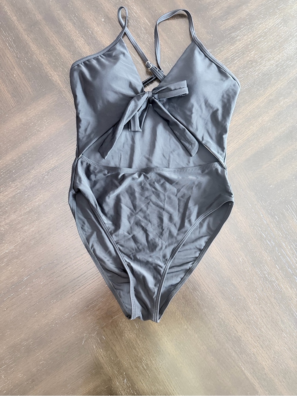 Black one piece swim with cut out